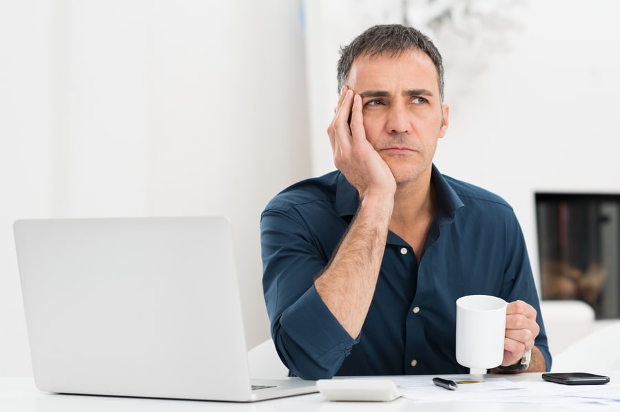 Unhappy Man At The Desk